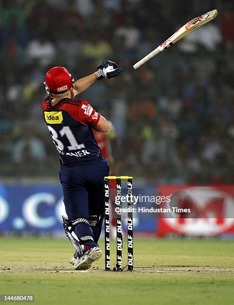 The bat of Delhi Daredevils batsman David Warner slipped out of his hands while playing a shot against Royal Challengers Bangalore in IPL T20 match...