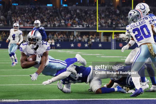 Michael Gallup of the Dallas Cowboys scores a touchdown in the second quarter of a game against the Indianapolis Colts at AT&T Stadium on December...