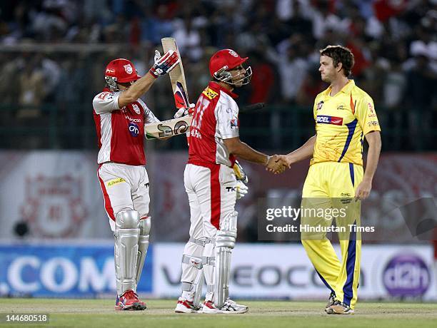 Kings XI Punjab batsman Adam Gilchrist and Azhar Mehmood congrulated by Chennai Super Kings player Albie Morkel on their victory during IPL Twenty 20...