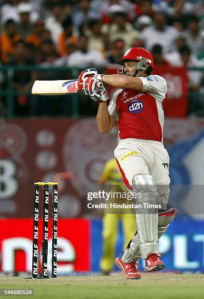 Kings XI Punjab batsman Adam Gilchrist plays a shot during IPL Twenty 20 cricket match between Kings XI Punjab and Chennai Super Kings at HPCA...