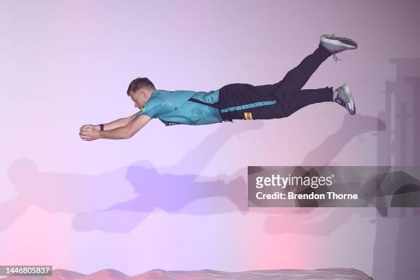 Sam Billings of the Heat takes part in a classic catch competition during the Big Bash Season Launch at The Venue on December 05, 2022 in Sydney,...