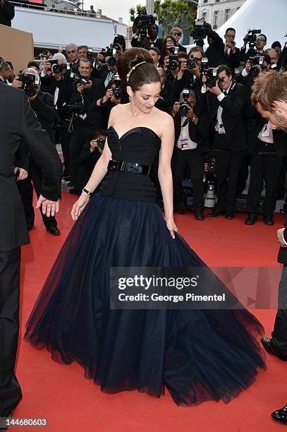 Actress Marion Cotillard attends the "De Rouille et D'os" Premiere during the 65th Annual Cannes Film Festival at Palais des Festivals on May 17,...