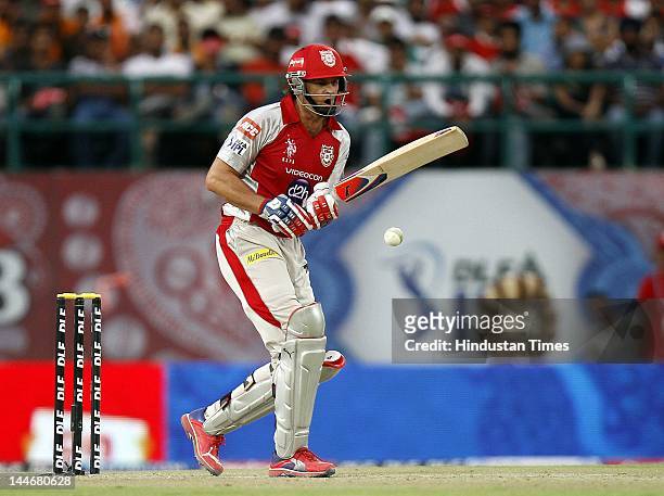Kings XI Punjab batsman Adam Gilchrist plays a shot during IPL Twenty 20 cricket match between Kings XI Punjab and Chennai Super Kings at HPCA...