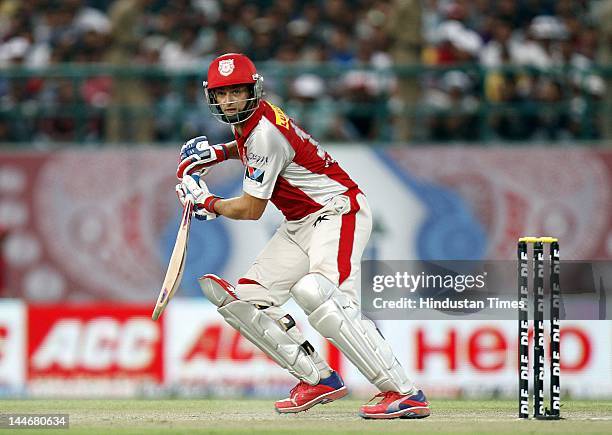 Kings XI Punjab batsman Adam Gilchrist plays a shot during IPL Twenty 20 cricket match between Kings XI Punjab and Chennai Super Kings at HPCA...