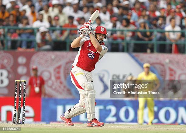 Kings XI Punjab batsman Adam Gilchrist plays a shot during IPL Twenty 20 cricket match between Kings XI Punjab and Chennai Super Kings at HPCA...