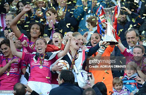 Lyon's players celebrate after winning the UEFA Women's Champions League final football match of Olympique Lyonnais vs 1 FFC Frankfurt, at the...