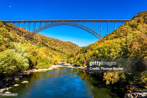 the river and bridge at new river gorge, the newest national park - fayetteville stock pictures, royalty-free photos & images