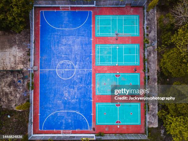 aerial view of basketball, football, badminton field - basketball court stock pictures, royalty-free photos & images