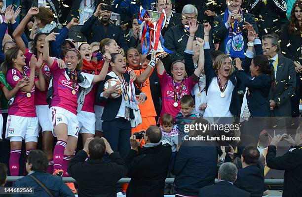 Sonia Bompastor of Olympique Lyonnais lifts the trophy and celebrates with team mates after winning the UEFA Women's Champions League Final at...