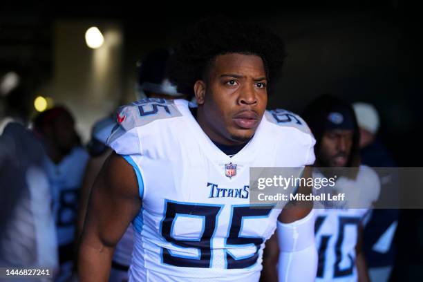 DeMarcus Walker of the Tennessee Titans makes his way onto the field prior to the game against the Philadelphia Eagles at Lincoln Financial Field on...