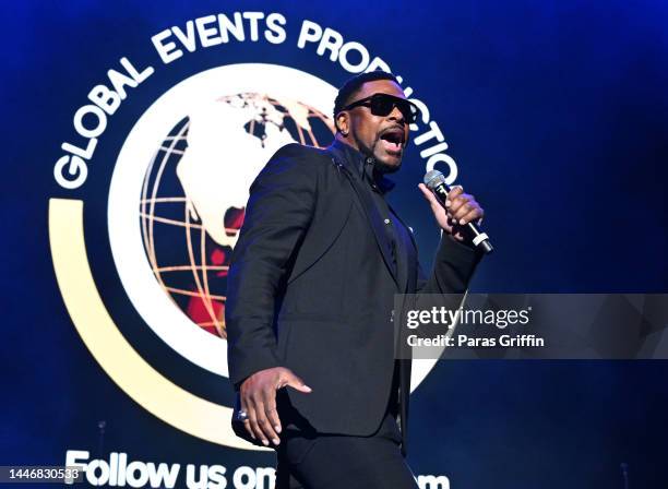 Comedian Chris Tucker speaks onstage during the R&B Music Experience: Holiday Edition at State Farm Arena on December 04, 2022 in Atlanta, Georgia.