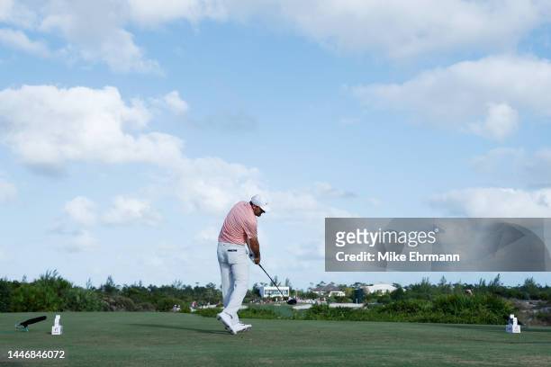 Scottie Scheffler of the United States plays his shot from the 14th tee during the final round Hero World Challenge at Albany Golf Course on December...