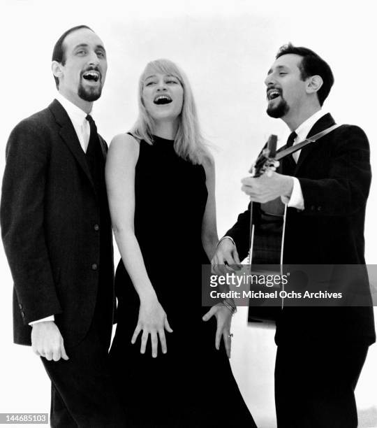 Paul Stookey, Mary Travers and Peter Yarrow of the folk group 'Peter, Paul & Mary' pose for a portrait circa 1965.