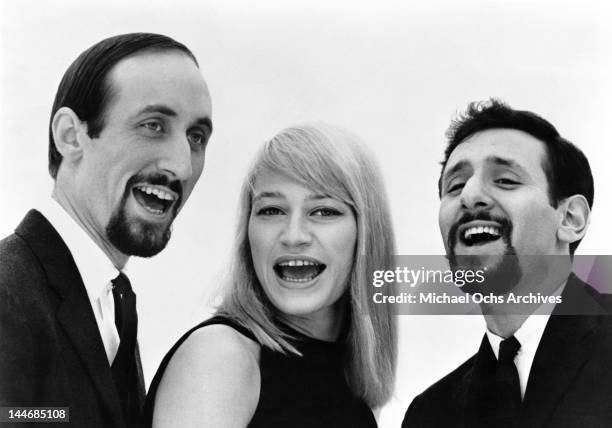 Paul Stookey, Mary Travers and Peter Yarrow of the folk group 'Peter, Paul & Mary' pose for a portrait circa 1965.