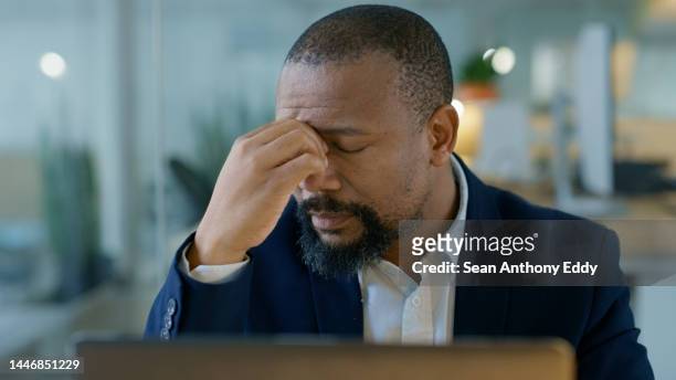 headache, burnout and business man stress about business report and 404 problem. tired black man frustrated with anxiety and mental health trouble from working overtime on computer glitch and fail - one mature man only stock pictures, royalty-free photos & images