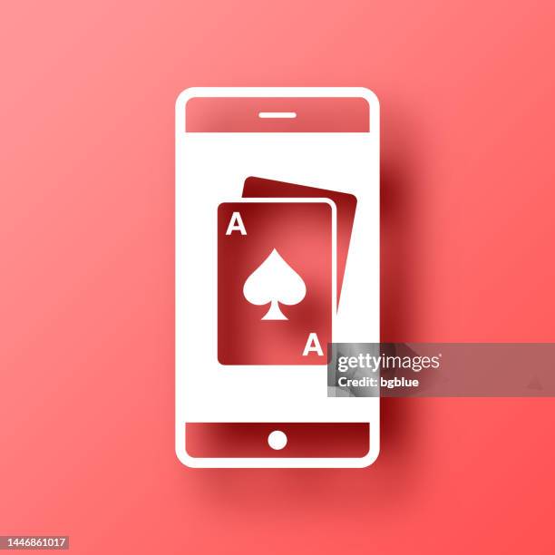 smartphone with playing card. icon on red background with shadow - visual tricks stock illustrations
