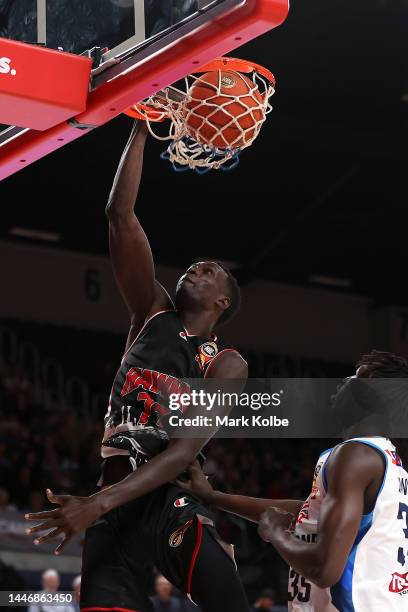 Deng Deng of the Hawks dunks during the round 9 NBL match between the Illawarra Hawks and Melbourne United at WIN Entertainment Centre, on December...