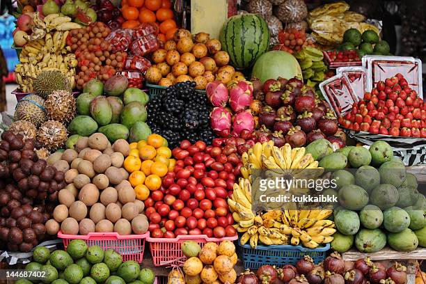 fruit market - fruit exotique photos et images de collection