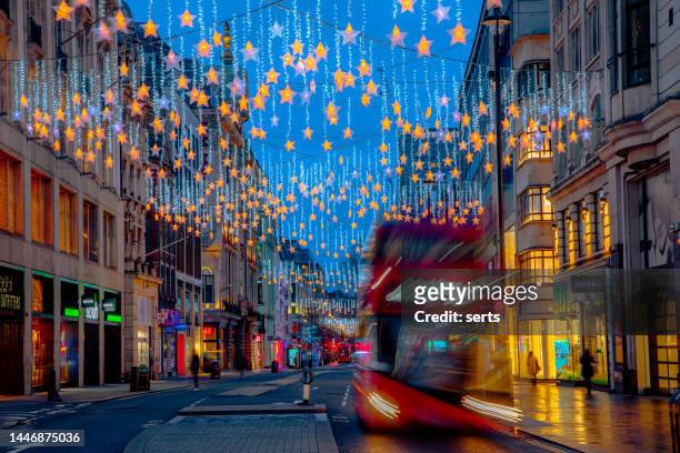 christmas lights in oxford street, london, uk - oxford street stockfoto's en -beelden