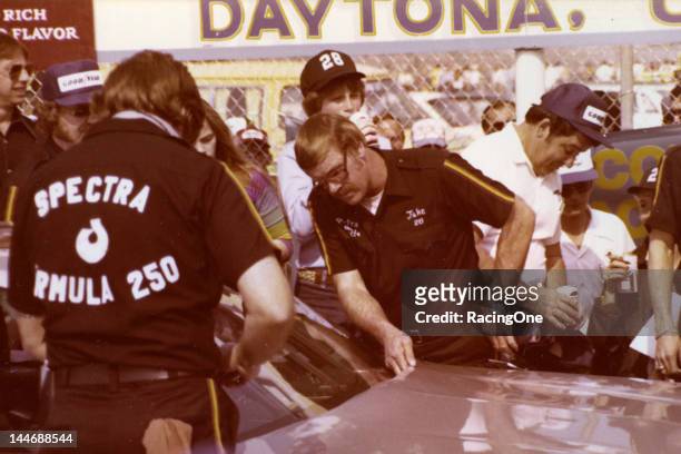 February 1979: Crew Chief Jake Elder makes a check of the Harry Ranier Spectra Racing Oldsmobile driven by Buddy Baker during Speed Week activity at...