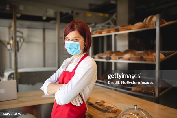 female owner of the bakery small business - bakery apron stock pictures, royalty-free photos & images