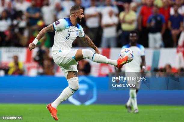 Kyle Walker of England kicks the ball during the FIFA World Cup Qatar 2022 Round of 16 match between England and Senegal at Al Bayt Stadium on...