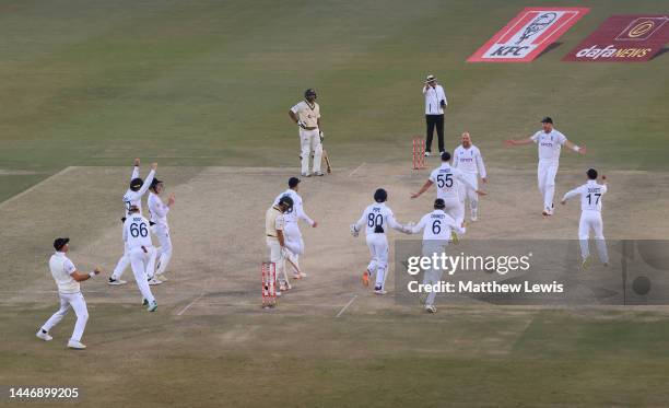 Jack Leach of England celebrates after taking the final wicket of Naseem Shah to win the First Test Match between Pakistan and England at Rawalpindi...