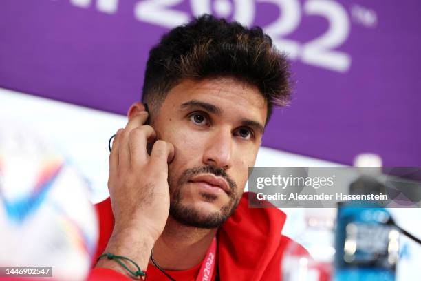 Munir El Kajoui of Morocco speaks during the Morocco Press Conference on match day -1 at main media center on December 05, 2022 in Doha, Qatar.