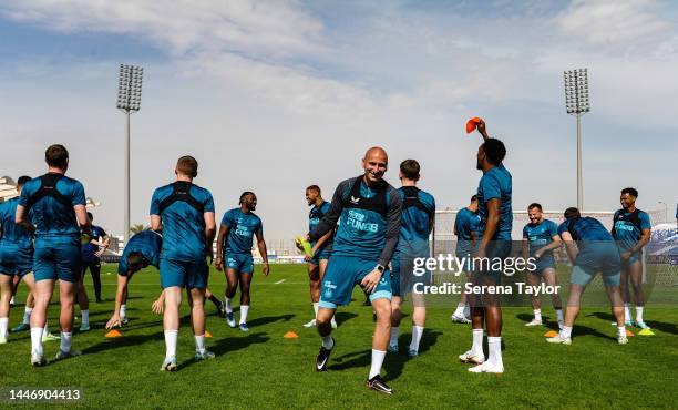 Jonjo Shelvey celebrates after winning a warm up game during the Newcastle United Training Session at the Al Hilal FC Training Centre on December 05,...