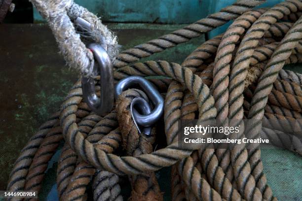 ropes on a fishing boat - fukui prefecture stock-fotos und bilder