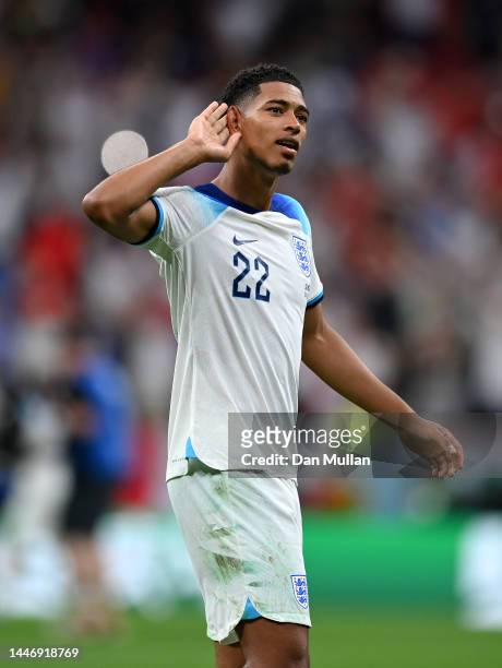 Jude Bellingham of England celebrates at the final whistle during the FIFA World Cup Qatar 2022 Round of 16 match between England and Senegal at Al...