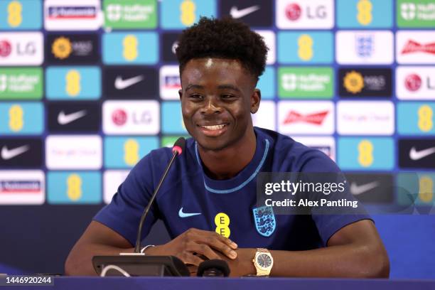 Bukayo Saka of England speaks during the England Press Conference on the day after the Round of 16 match against Senegal at Al Wakrah Stadium on...