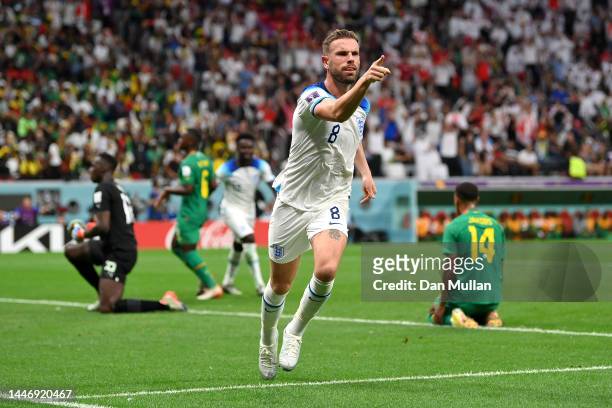 Jordan Henderson of England celebrates scoring his side's first goal during the FIFA World Cup Qatar 2022 Round of 16 match between England and...