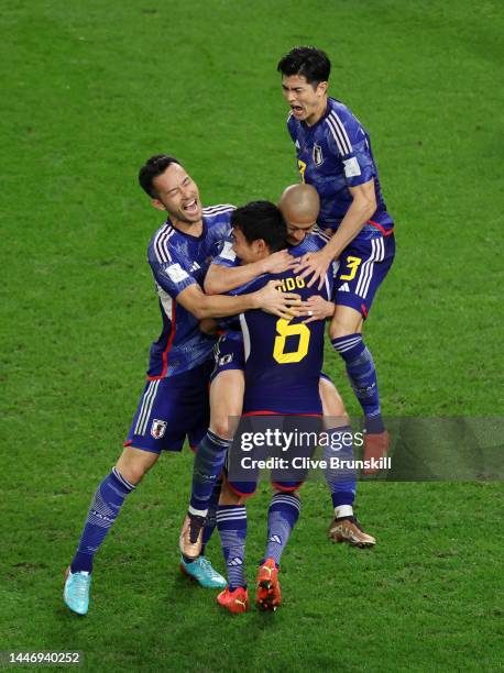 Daizen Maeda of Japan celebrates after scoring the team's first goal during the FIFA World Cup Qatar 2022 Round of 16 match between Japan and Croatia...