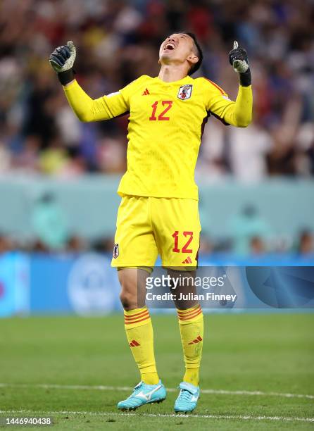 Shuichi Gonda of Japan celebrates their first goal by Daizen Maeda during the FIFA World Cup Qatar 2022 Round of 16 match between Japan and Croatia...