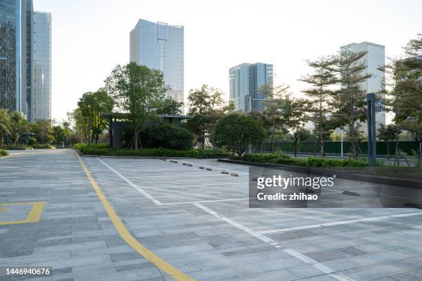 parking spaces in car parks in the financial district - parking space imagens e fotografias de stock