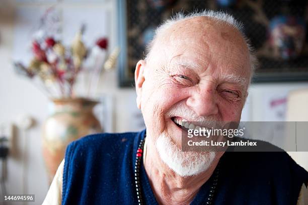 elderly man laughing - ziegenbart stock-fotos und bilder