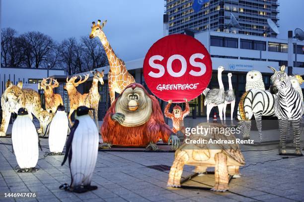 Illuminated effigies of animals set up in front of the United Nations campus by Greenpeace are pictured to protest for better global biodiversity...