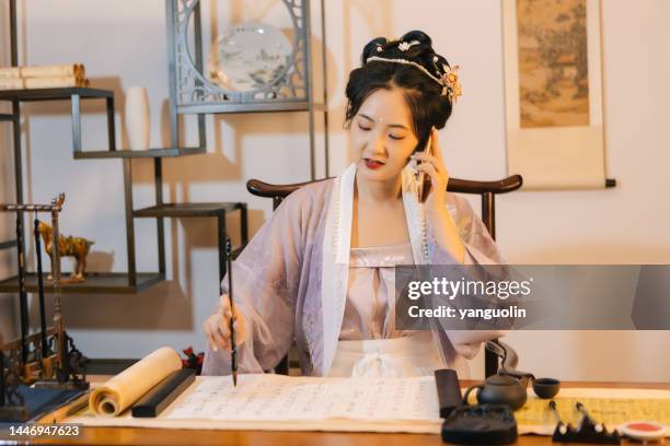 asian hanfu beauties use tablet computers to draw with brushes - paint microsoft stock pictures, royalty-free photos & images