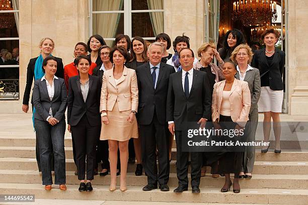 French President Francois Hollande and Prime Minister Jean-Marc Ayrault pose with women of the cabinet after the first weekly cabinet meeting at...