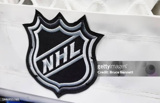 Closeup view of the NHL logo on a hockey net prior to the game between the New York Islanders and the Chicago Blackhawks at the UBS Arena on December...