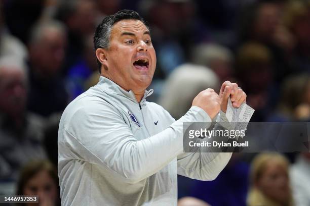 Head coach Sean Miller of the Xavier Musketeers calls out instructions in the first half against the West Virginia Mountaineers at the Cintas Center...