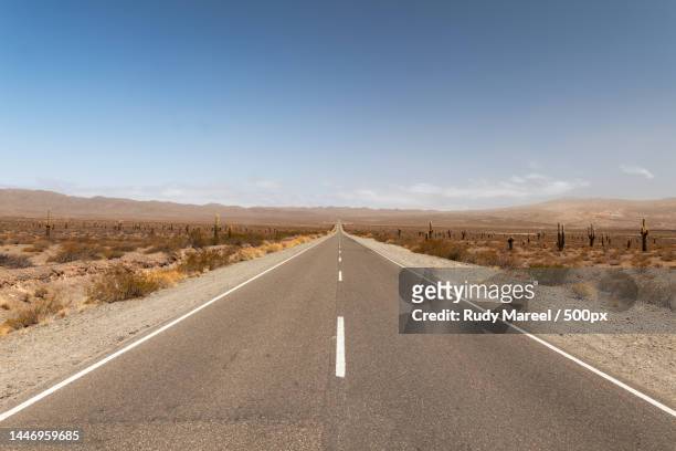 empty road along countryside landscape,cachi,salta,argentina - desert road stock pictures, royalty-free photos & images