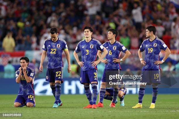 Japan players show dejection after their defeat through the penalty shoo during the FIFA World Cup Qatar 2022 Round of 16 match between Japan and...