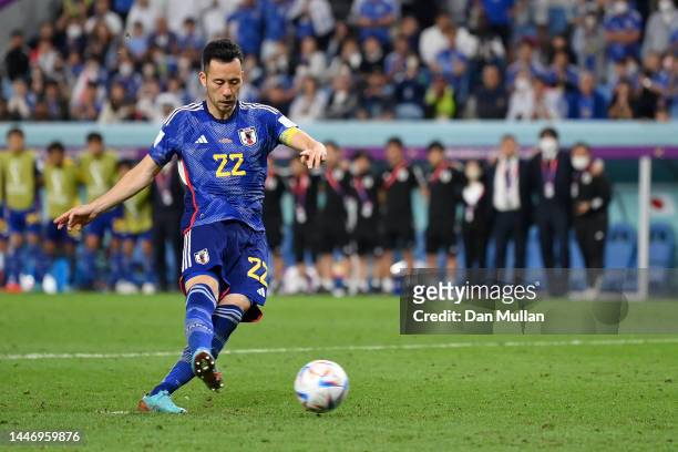 Maya Yoshida of Japan misses the team's fourth penalty in the penalty shoot out during the FIFA World Cup Qatar 2022 Round of 16 match between Japan...