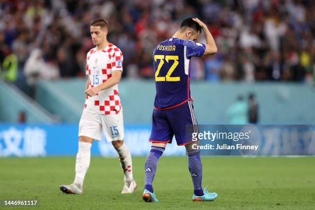 Maya Yoshida of Japan reacts after missing their sides fourth penalty during the FIFA World Cup Qatar 2022 Round of 16 match between Japan and...