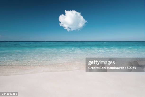 scenic view of sea against blue sky,indonesia - hendrawan stock pictures, royalty-free photos & images