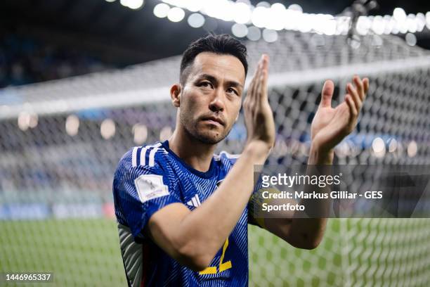 Maya Yoshida of Japan looks dejected and shows appreciation to the fans after the FIFA World Cup Qatar 2022 Round of 16 match between Japan and...
