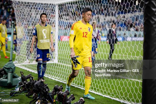 Shuichi Gonda of Japan looks dejected after the FIFA World Cup Qatar 2022 Round of 16 match between Japan and Croatia at Al Janoub Stadium on...