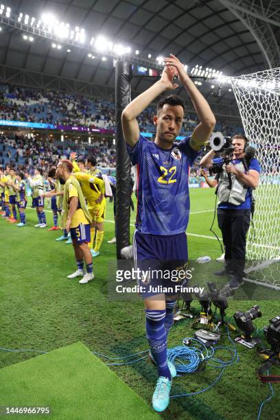 Maya Yoshida of Japan applauds fans after the team's defeat through the penalty shootout during the FIFA World Cup Qatar 2022 Round of 16 match...